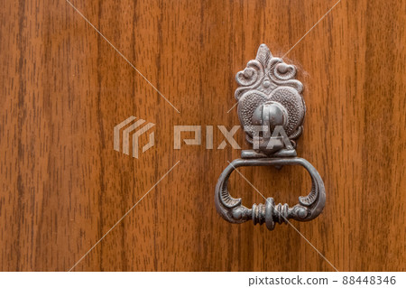 Iron antique door retro vintage style old handle, close-up 88448346