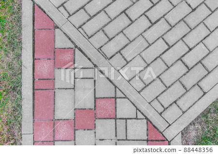 Gray sidewalk tile street stone city road abstract urban pattern color red or pink design texture paving background Gray sidewalk tile street stone city road abstract urban pattern color red or pink design texture paving background 88448356