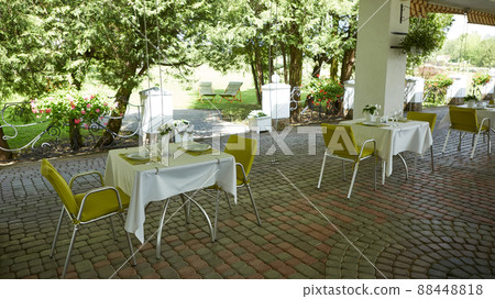 terrace summer cafe with tables and chairs for people, an empty institution for recreation, nobody terrace summer cafe with tables and chairs for people, an empty institution for recreation, nobody 88448818