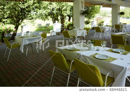 terrace summer cafe with tables and chairs for people, an empty institution for recreation, nobody 88448821