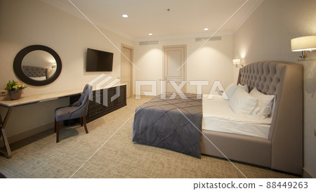 Interior of white and gray cozy bedroom 88449263