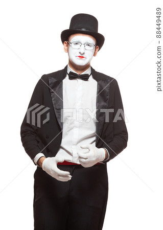 Portrait of a male mime artist performing, isolated on white background. Symbol of failure, frustration, broken hopes, sadness 88449489