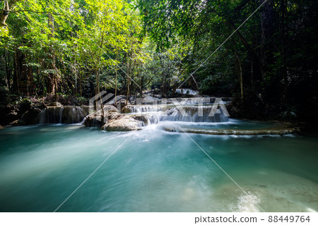 Erawan Waterfall,beautiful waterfall deep forest in Thailand Erawan Waterfall,beautiful waterfall deep forest in Thailand 88449764