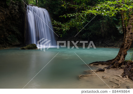 Erawan Waterfall,beautiful waterfall deep forest in Thailand Erawan Waterfall,beautiful waterfall deep forest in Thailand 88449864