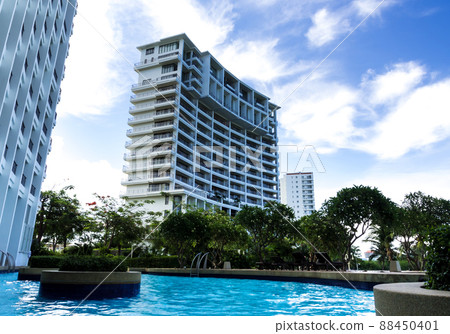 The high rise building view from the swimming pool The high rise building view from the swimming pool 88450401