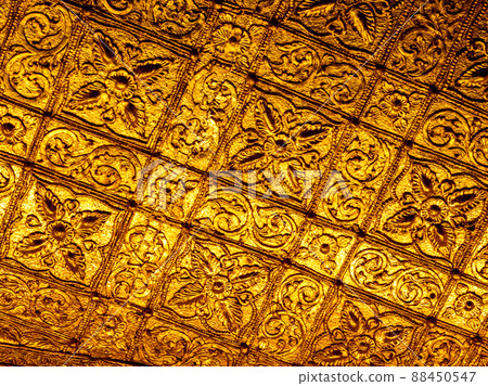 Beautiful Burmese art pattern motifs decorative design on the golden walls of the rooms in the temple Beautiful Burmese art pattern motifs decorative design on the golden walls of the rooms in the temple 88450547