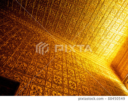 Burmese art pattern motifs decorative design on the golden walls of the rooms in the temple Burmese art pattern motifs decorative design on the golden walls of the rooms in the temple 88450549