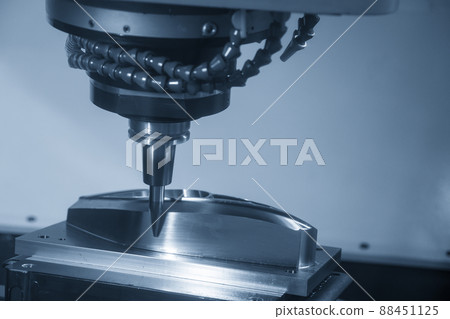 The CNC milling machine cutting the mold parts by barrel tool. 88451125