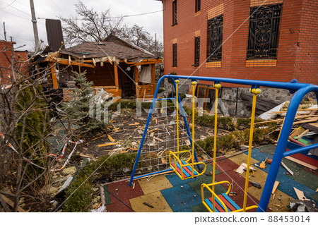 Bila Tserkva, Kyev region Ukraine - 04.03.2022: The consequences of an airstrike, a missile attack on residential buildings in Bila Tserkva. Russian troops destroy houses, people in Ukraine. Bila Tserkva, Kyev region Ukraine - 04.03.2022: The consequences of an airstrike, a missile attack on residential buildings in Bila Tserkva. Russian troops destroy houses, people in Ukraine. 88453014