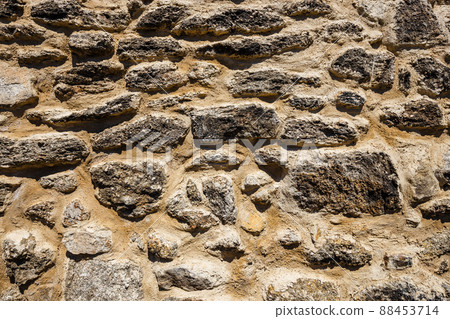 brown stone wall texture closup background brown stone wall texture closup background 88453714