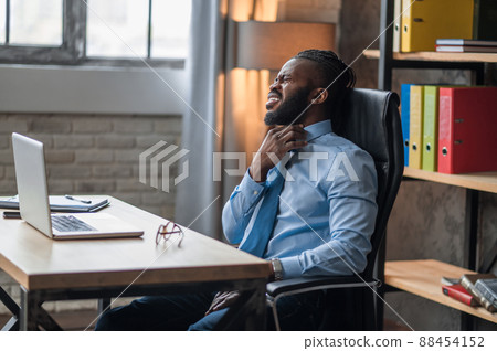 Office worker suffering from a sore throat 88454152