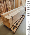 stacked wooden boards in a woodworking industry. stacks with pine lumber. folded edged board. wood harvesting shop. timber for construction, increase in timber prices, 88458013