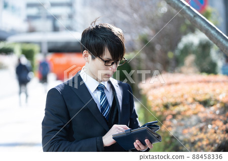 Businessman smartphone Businessman smartphone 88458336