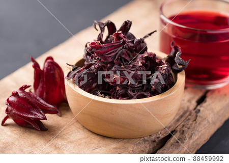 Dry roselle and tea on wooden background, Healthy herbal drink Dry roselle and tea on wooden background, Healthy herbal drink 88459992