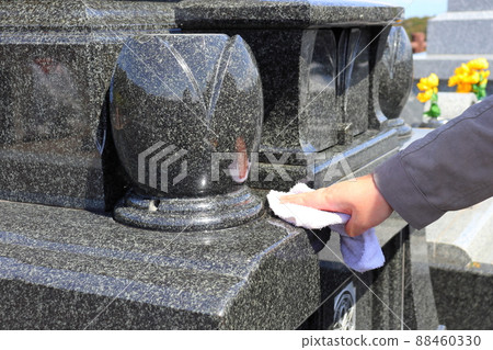 Visiting a grave Cleaning Visiting a grave Cleaning 88460330