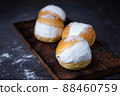 Homemade MARITOZZO is Italian bread stuffed with whipped cream. 88460759