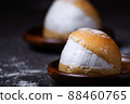 Homemade MARITOZZO is Italian bread stuffed with whipped cream. 88460765