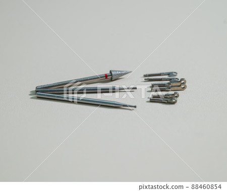Glasses repair tools on white table. 88460854