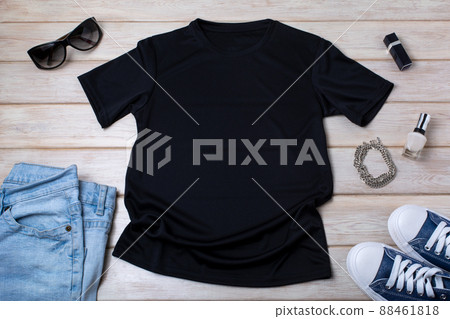 Womens  black T-shirt mockup with blue jeans, nail polish 88461818