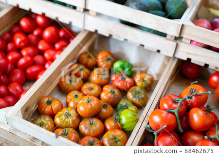 Boxes with tomatoes in store 88462675