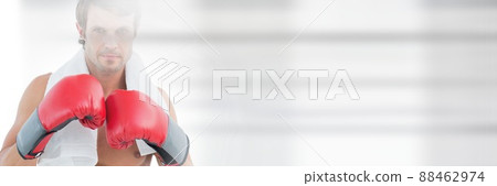 Blur effect with copy space against portrait of caucasian male boxer against grey background 88462974