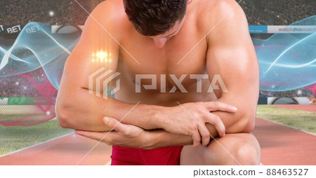 Light spot over caucasian fit man sitting on his knees on sports track against digital waves Light spot over caucasian fit man sitting on his knees on sports track against digital waves 88463527