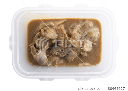 Thai style fermented fish in plastic container isolated on white 88463627