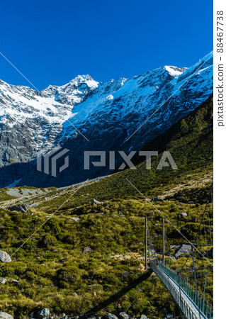 The third suspension bridge on the Hooker Valley Track in Aoraki Mount Cook National Park, New Zealand 88467738