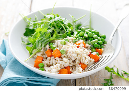 Barley porridge with green peas, baked pumpkin and fresh arugula salad 88470099