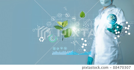 Scientists touching blue earth and researching renewable energy with plant and icon ecology on blue background 88470307