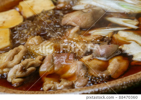Sukiyaki of duck, one of the typical meat dishes in Japan 88470360