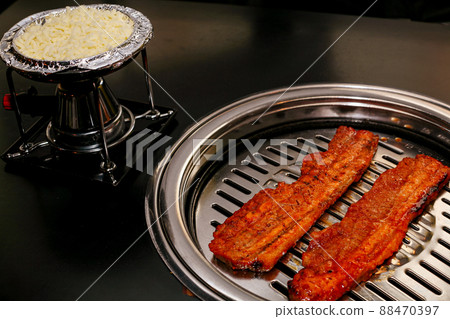 Korean grilled meat samgyeopsal cheese fondue Korean grilled meat samgyeopsal cheese fondue 88470397