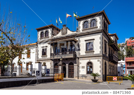 Teror at Gran Canaria, Spain. A beautiful traditional town with colorful houses with wooden balconies Teror at Gran Canaria, Spain. A beautiful traditional town with colorful houses with wooden balconies 88471360