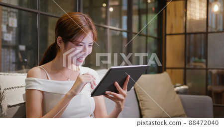 asian woman use digital tablet asian woman use digital tablet 88472040