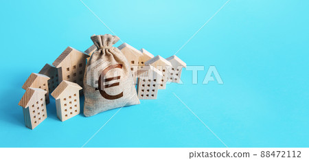 Euro money bag surrounded by houses. Buying apartments. Real estate investment. Mortgage loan. Budget and funding. Construction industry. Property insurance. Housing appraisal. Valuation estimation Euro money bag surrounded by houses. Buying apartments. Real estate investment. Mortgage loan. Budget and funding. Construction industry. Property insurance. Housing appraisal. Valuation estimation 88472112