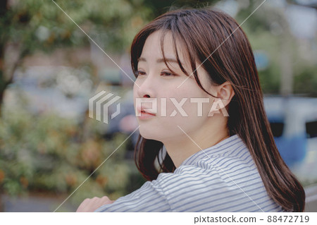 Outdoor portrait of a young woman Outdoor portrait of a young woman 88472719