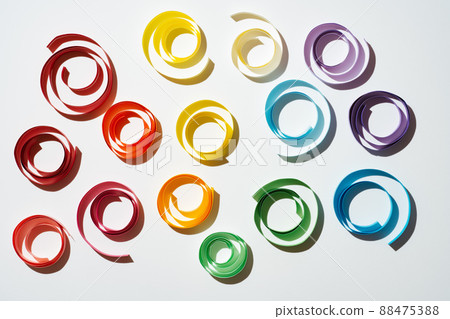 Rainbow colored paper circles on white background Rainbow colored paper circles on white background 88475388