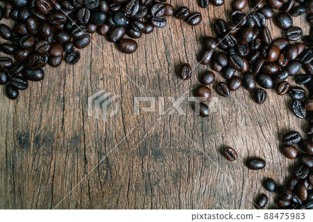 Roasted coffee bean flat lay on wood background Roasted coffee bean flat lay on wood background 88475983