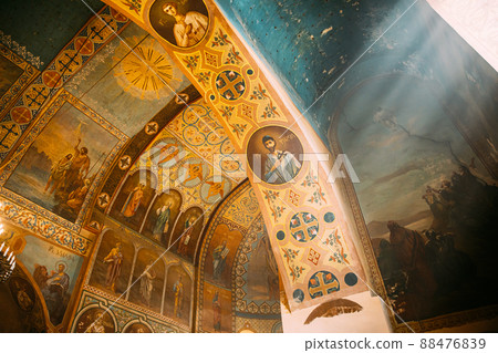 Mtskheta, Georgia. Sun ray shining in church. Fresco, Frescoes. Icons, of Shio-Mgvime Monastery. interior of Upper Church Of Holy Virgin Or Theotokos, Central Part Of Medieval Monastic ShioMgvime Mtskheta, Georgia. Sun ray shining in church. Fresco, Frescoes. Icons, of Shio-Mgvime Monastery. interior of Upper Church Of Holy Virgin Or Theotokos, Central Part Of Medieval Monastic ShioMgvime 88476839