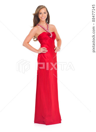 Such beauty and elegance. Studio shot of a stylish young woman in a red dress isolated on white. 88477145
