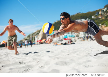 Mine. Shot of a beach volleyball game on a sunny day. 88478406