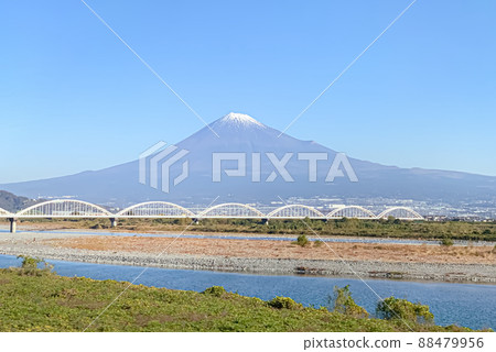 View of Mt. Fuji, Fuji River, and Fuji River Aqueduct in autumn as seen from the Tokaido Shinkansen View of Mt. Fuji, Fuji River, and Fuji River Aqueduct in autumn as seen from the Tokaido Shinkansen 88479956