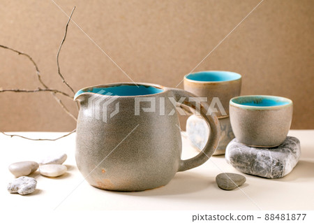Set of empty grey ceramic cups 88481877