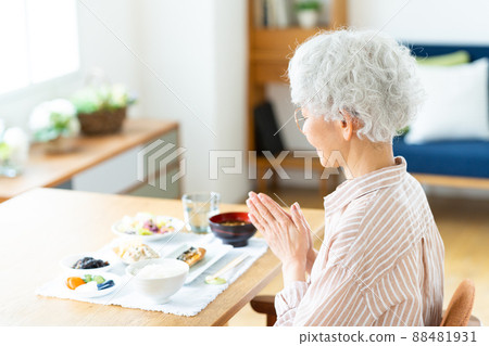 Senior woman eating Senior woman eating 88481931