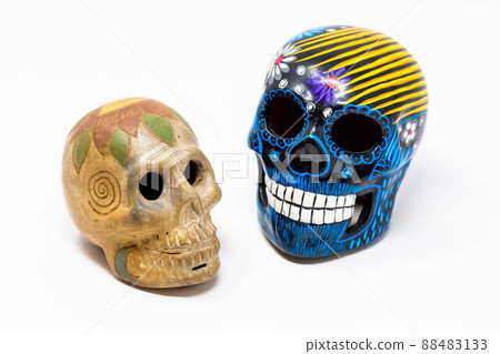 Pair of Patterned Ceramic Day of the Dead Skulls 88483133