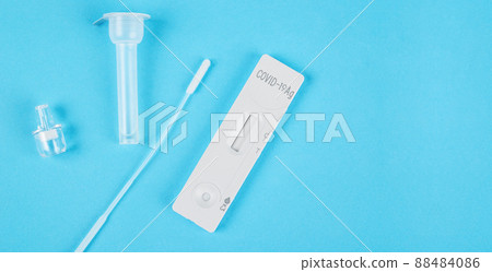 Rapid antigen test, top view isolated blue background with copy space. Rapid antigen test, top view isolated blue background with copy space. 88484086