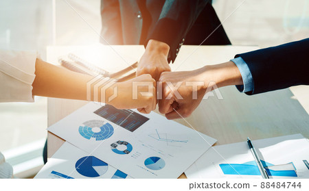 Teamwork Join Hands Support Together Collaboration Concept. Asian business people show symbolic hand for promised purpose to achieve the goal 88484744