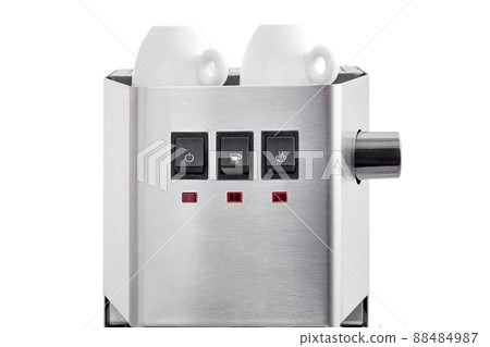 2 ceramic white espresso cups stand on warming top of a coffee machine, a steel coffee maker and black home appliance control buttons with icons and light indicator isolated on a white background. 88484987