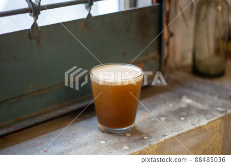 Coffee time at a fashionable cafe (with copy space) 88485036