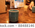 Teacup and table 88488146